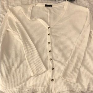 White long sleeve sweater with buttons
